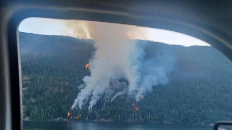 Wildfire ignites on northern bank of Cameron Lake